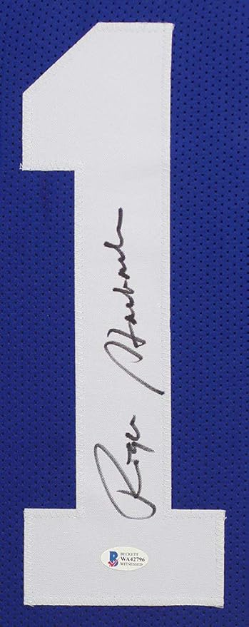 Roger Staubach Autographed Blue Dallas Jersey - Beautifully Matted and Framed - Hand Signed By Staubach and Certified Authentic by Beckett - Includes Certificate of Authenticity