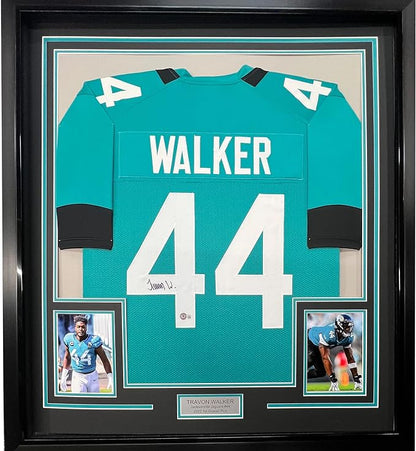 Framed Autographed/Signed Travon Walker 35x39 Jacksonville Teal Football Jersey Beckett BAS COA